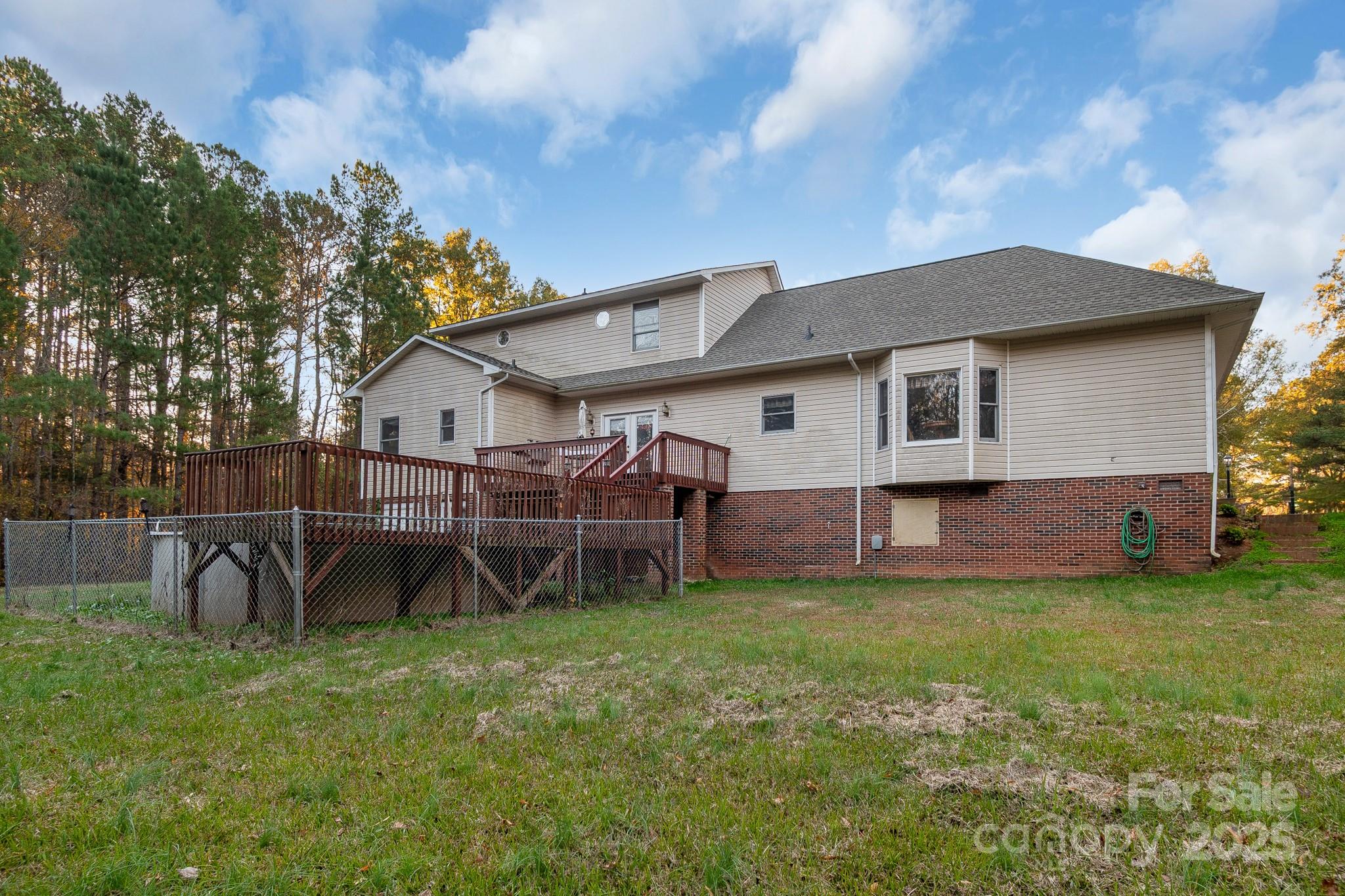 2775 State Rd S-29-285 Lancaster, SC 29720 - Photo 6 of 48 a view of a house with a yard and sitting area