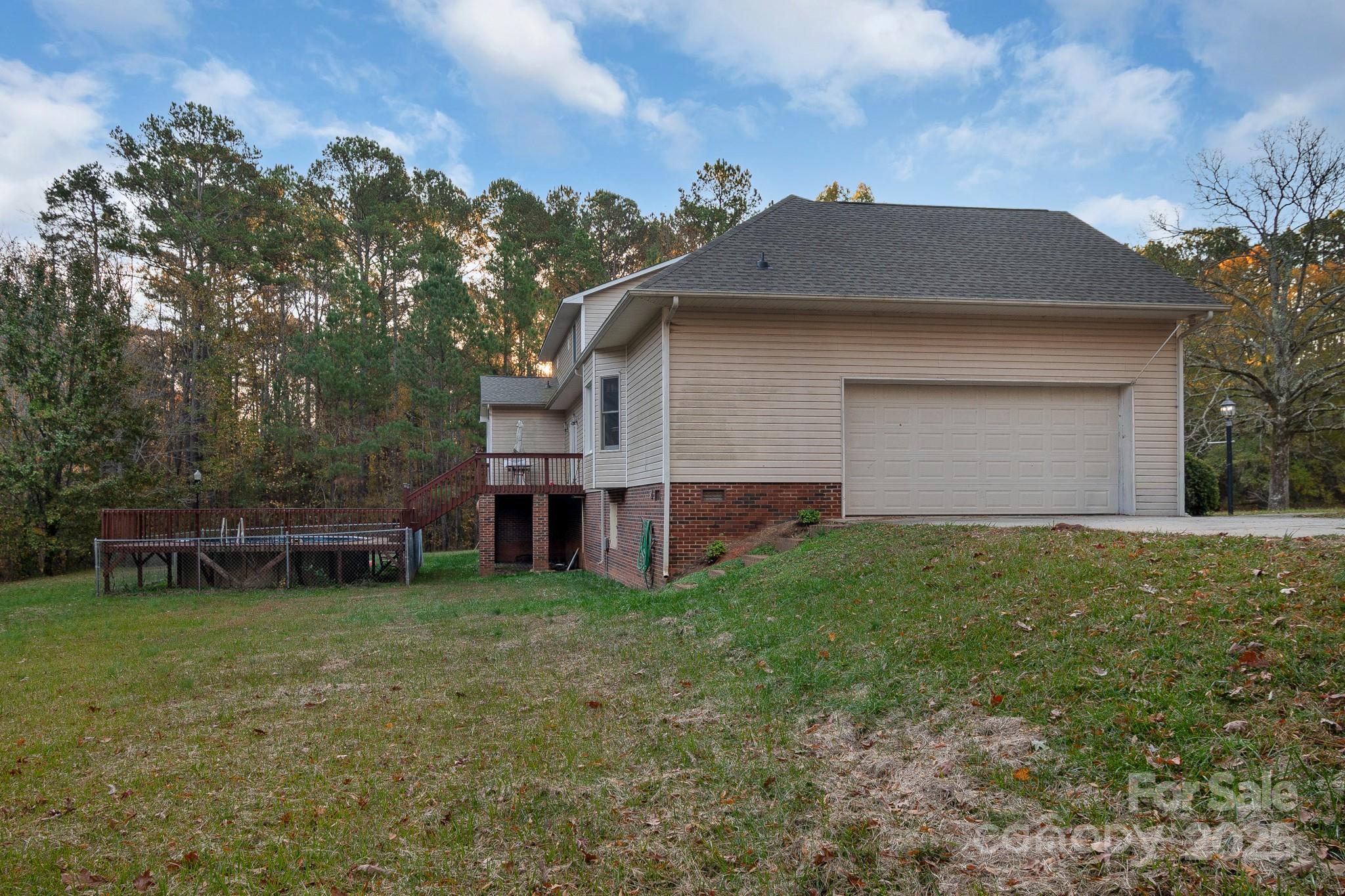 2775 State Rd S-29-285 Lancaster, SC 29720 - Photo 8 of 48 a view of a house with a yard
