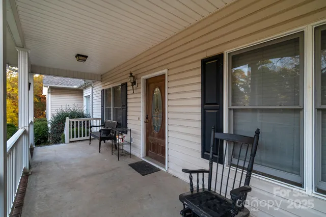 a view of a porch with furniture