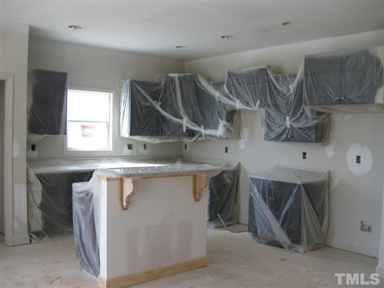 8013 Creech Road Middlesex, NC 27557 - Photo 3 of 11 a utility room with cabinets
