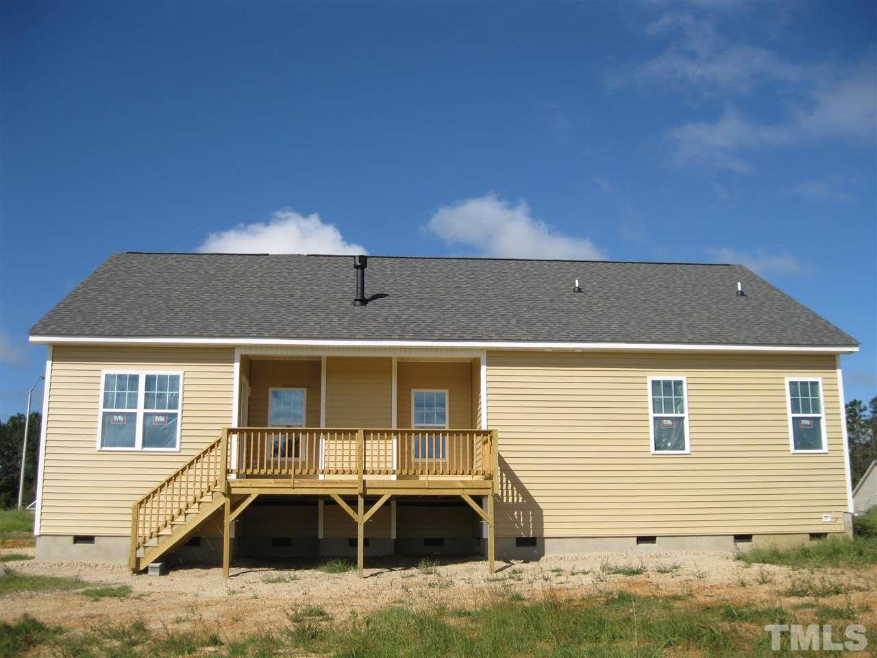 8013 Creech Road Middlesex, NC 27557 - Photo 4 of 11 a front view of a house with parking space