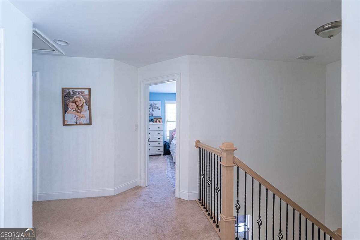 3093 Surry Ridge Drive Watkinsville, GA 30677 - Photo 23 of 41 a view of a hallway with workspace