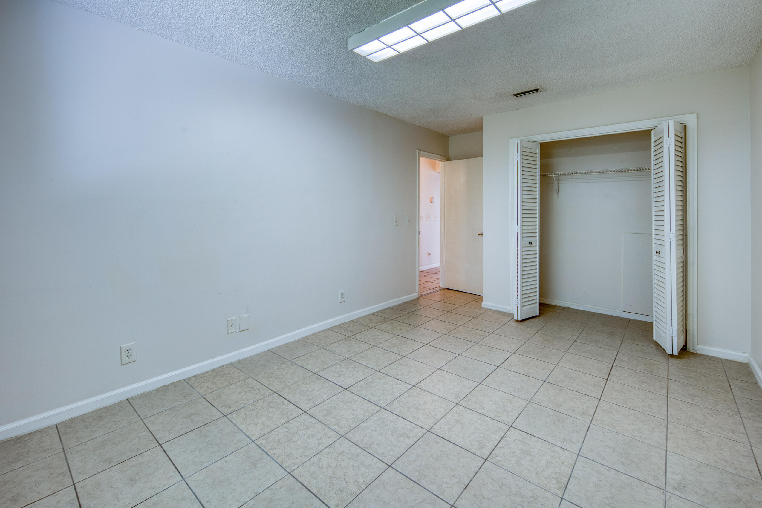 809 North Federal Highway, Unit 3 Lake Worth Beach, FL 33460 - Photo 17 of 31 an empty room with windows