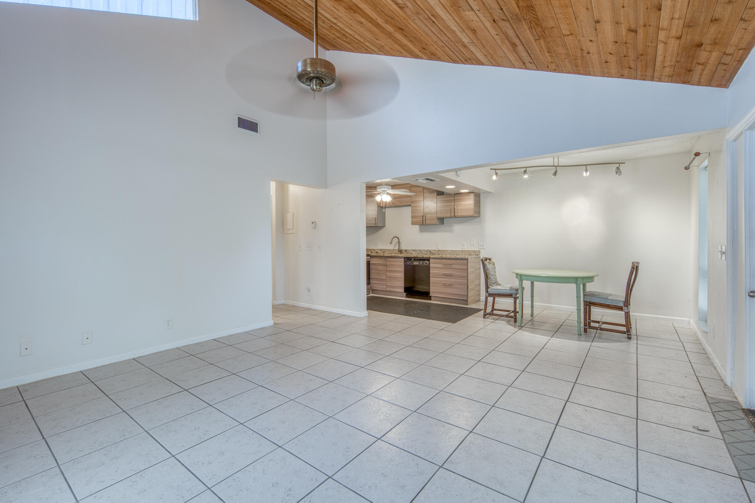 809 North Federal Highway, Unit 3 Lake Worth Beach, FL 33460 - Photo 28 of 31 a view of an empty room with a fireplace