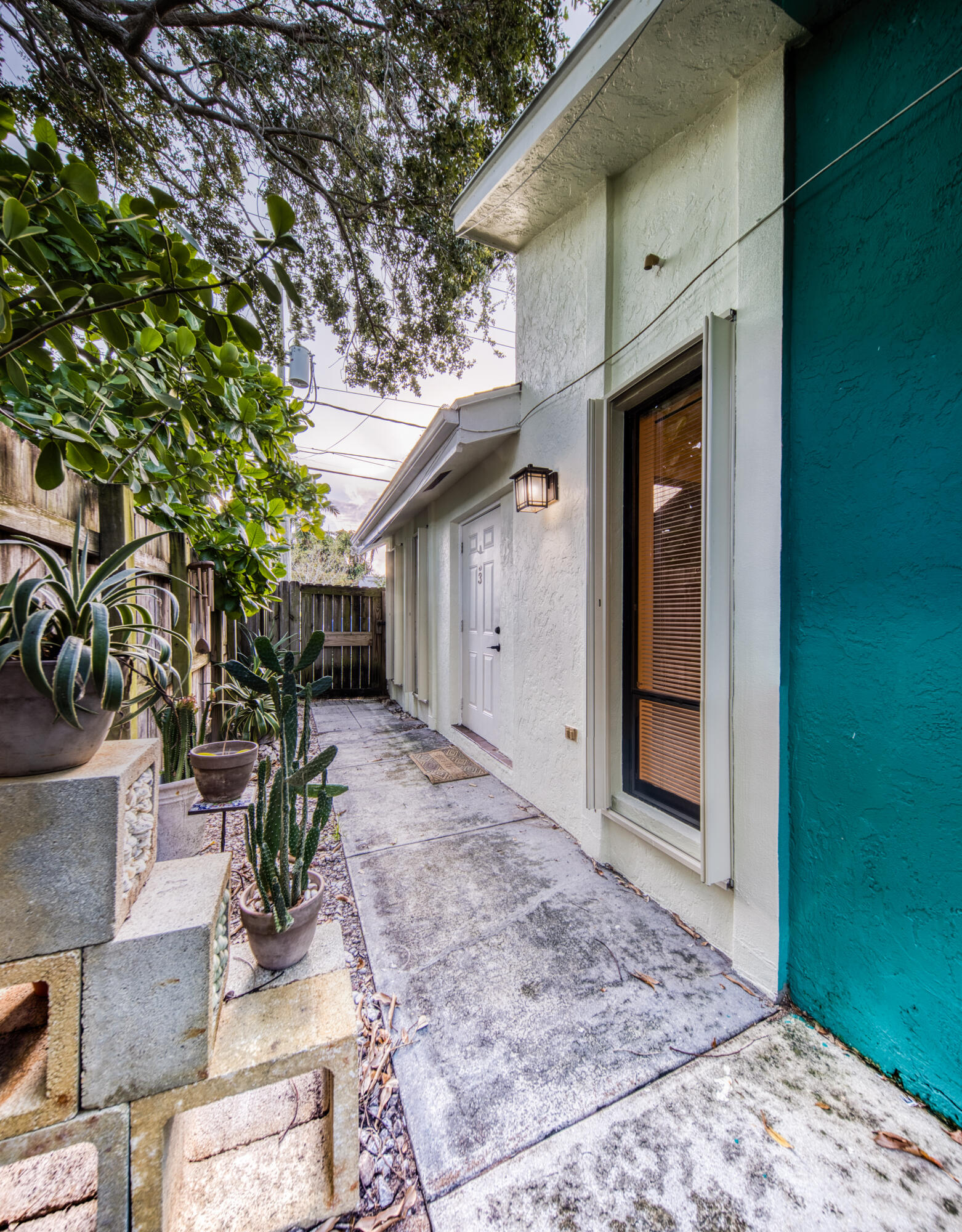 809 North Federal Highway, Unit 3 Lake Worth Beach, FL 33460 - Photo 31 of 31 a view of a house with a patio and backyard