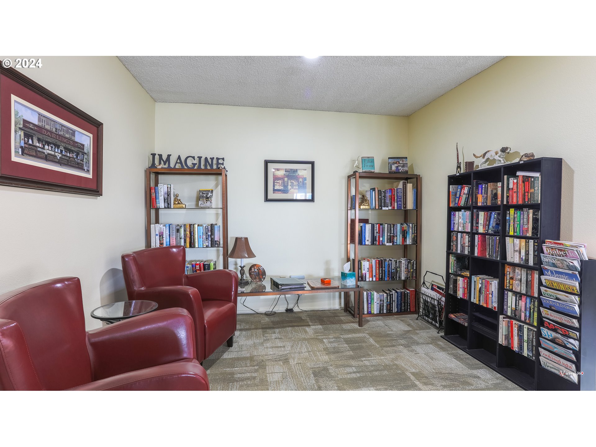 950 Evergreen Road, Unit 316 Woodburn, OR 97071 - Photo 23 of 38 a living room with furniture and a book shelf