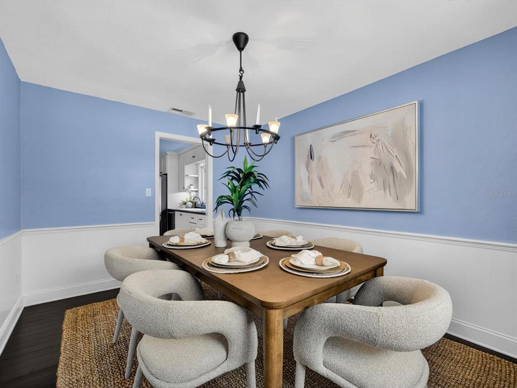 333 Cornwall Road Winter Park, FL 32792 - Photo 16 of 32 a view of a dining room with furniture and wooden floor