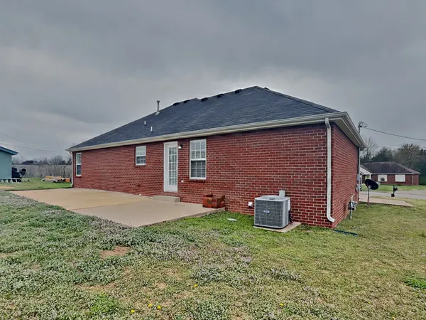 a backyard of a house with lots of green space