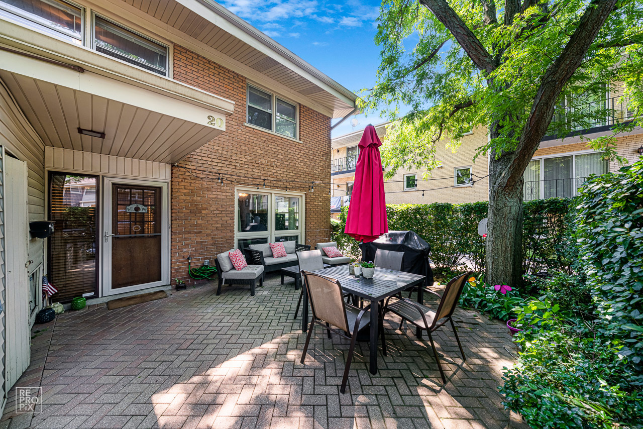 20 North Dee Road Park Ridge, IL 60068 - Photo 2 of 15 a view of a house with backyard sitting area and garden