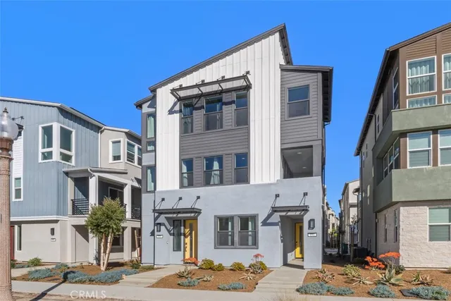 a front view of a building with street view