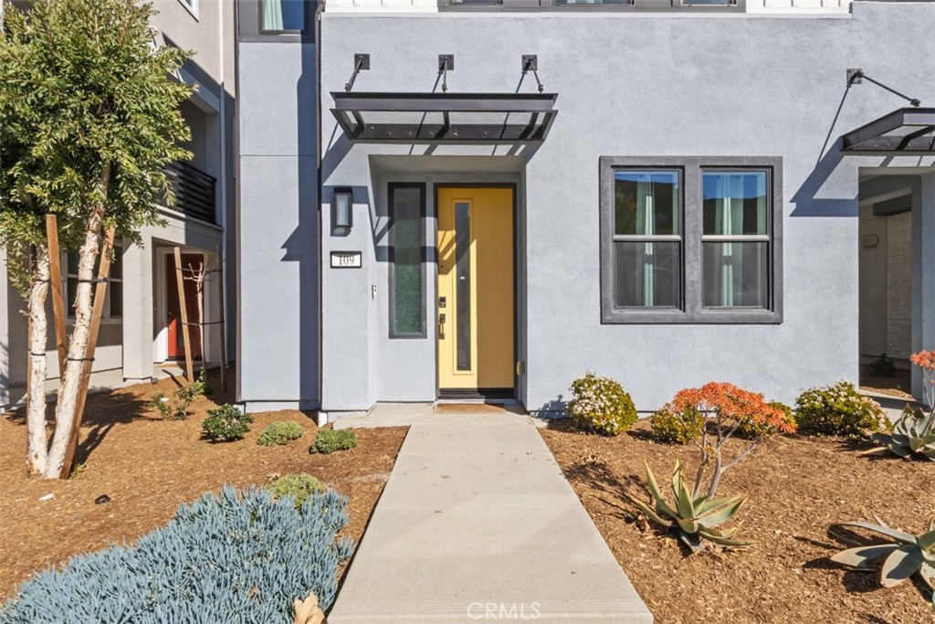109 Mirth Irvine, CA 92618 - Photo 3 of 43 a front view of a house