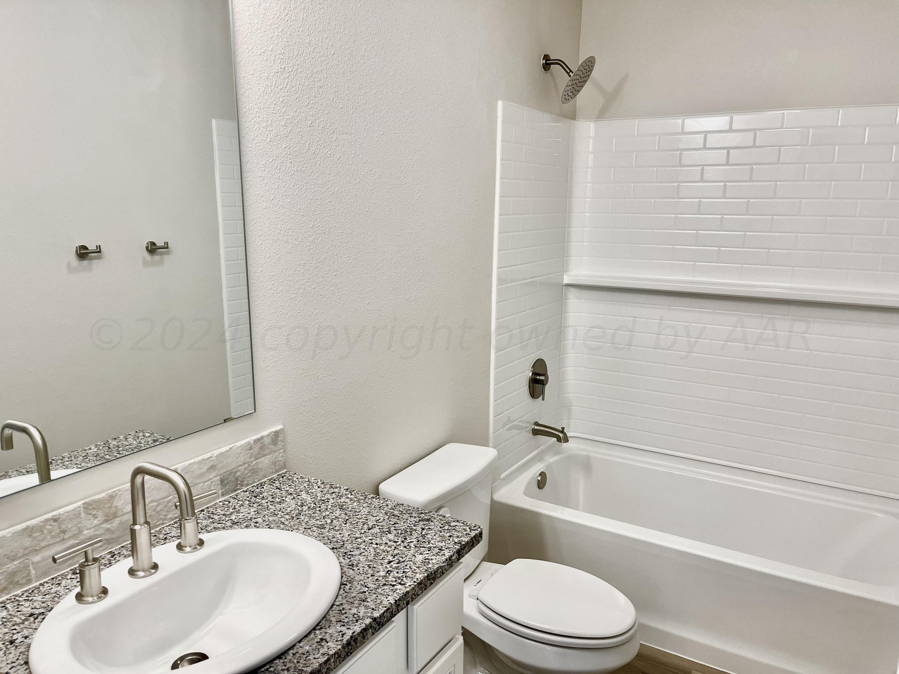 7516 John Thomas Street Amarillo, TX 79119 - Photo 15 of 17 7516 Bath