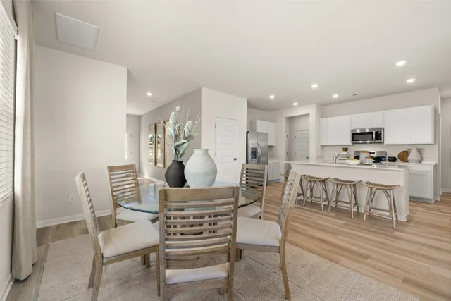 a bathroom with a sink mirror and a vanity
