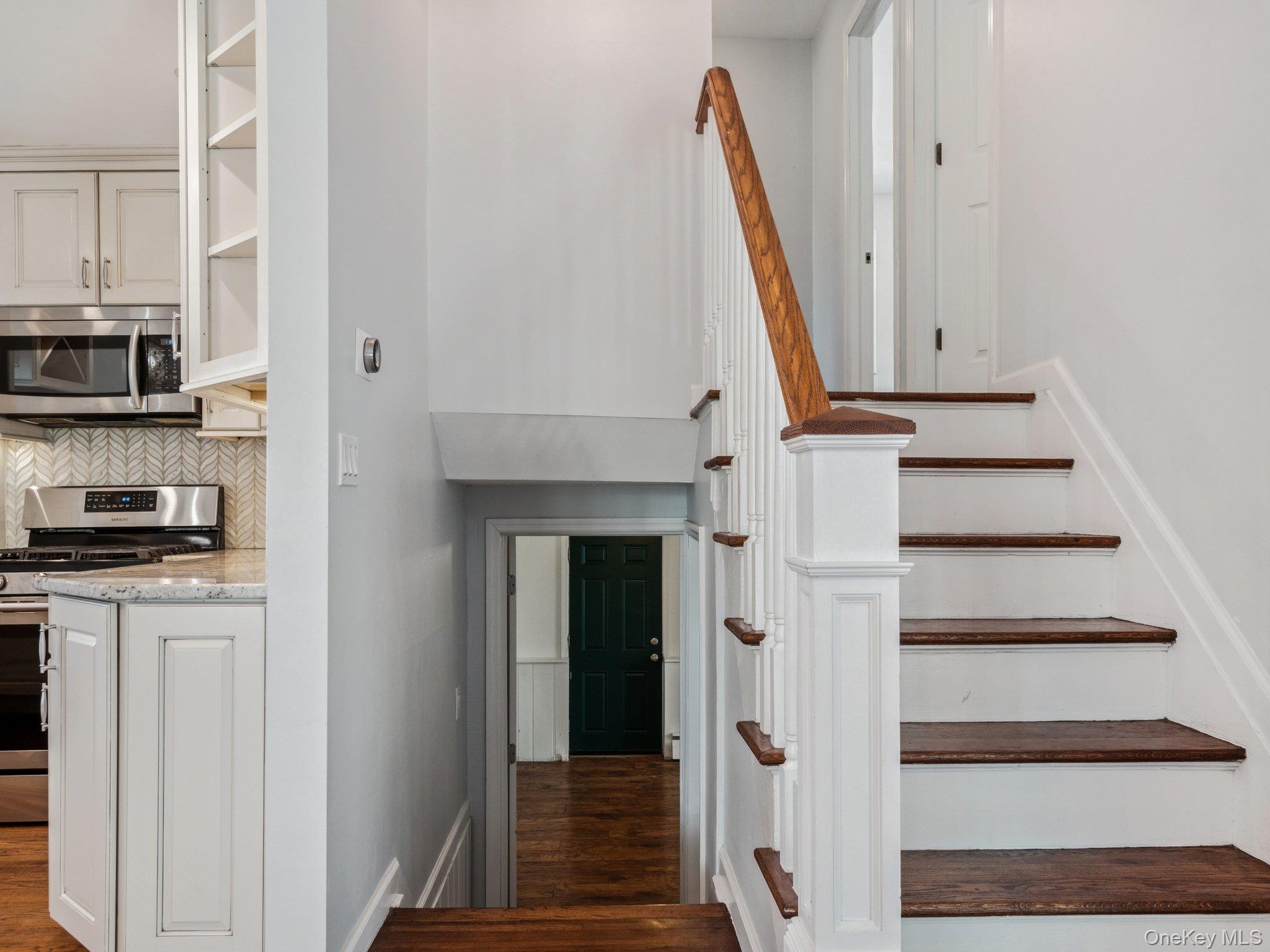 247 Woods Road North Babylon, NY 11703 - Photo 24 of 43 a view of a front door with wooden floor