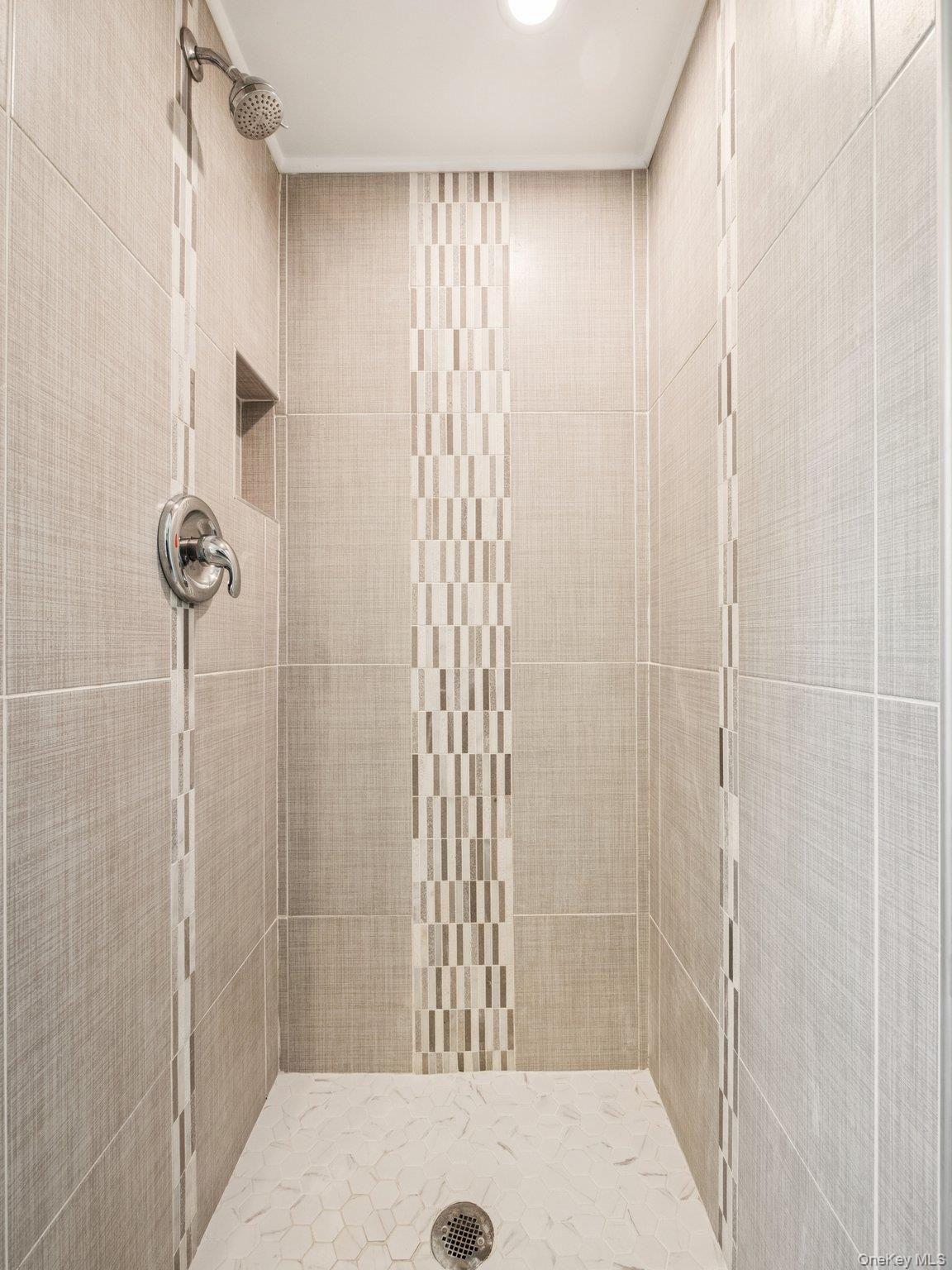 247 Woods Road North Babylon, NY 11703 - Photo 28 of 43 a bathroom with a shower