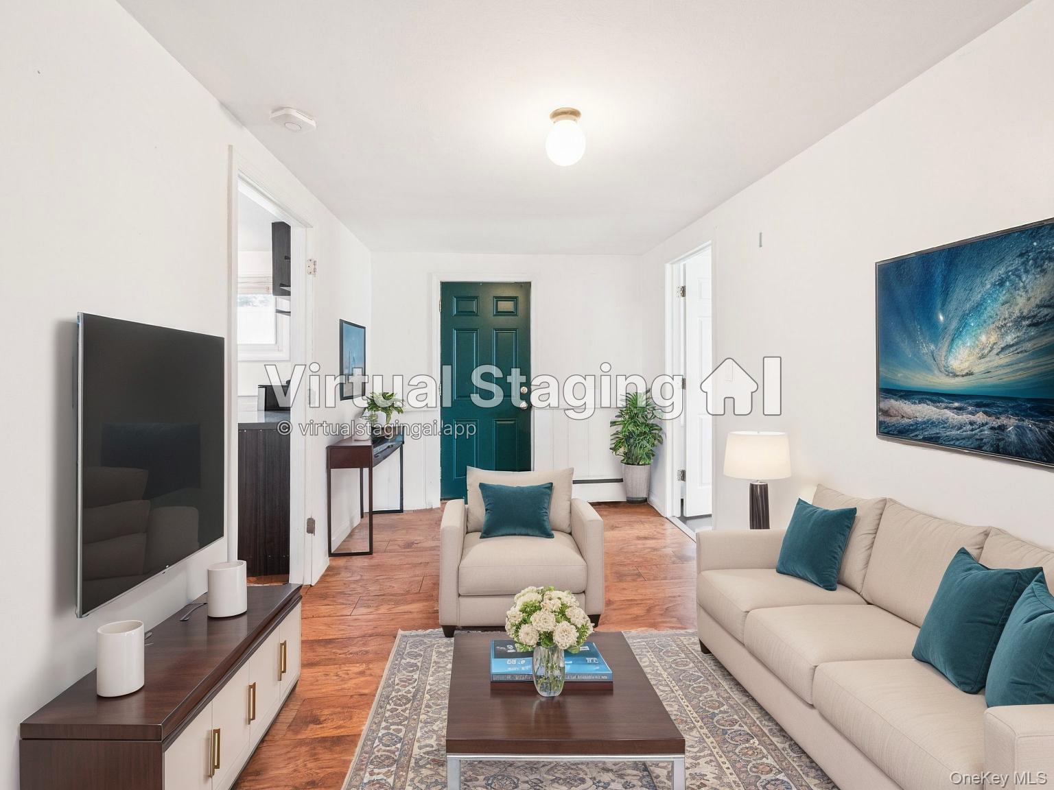 247 Woods Road North Babylon, NY 11703 - Photo 35 of 43 a living room with furniture a flat screen tv and a refrigerator