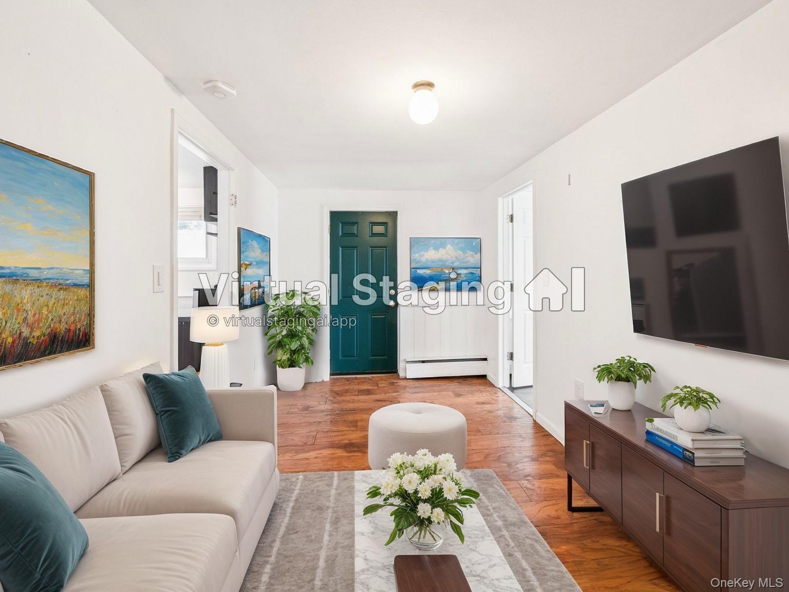 247 Woods Road North Babylon, NY 11703 - Photo 36 of 43 a living room with furniture and a flat screen tv