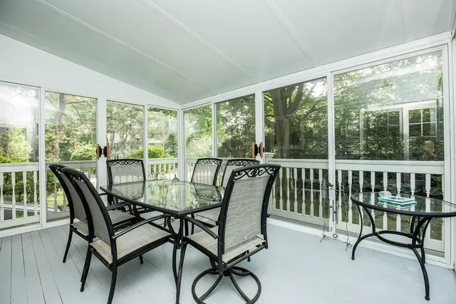 a view of a city from a dining room with furniture window and outside view