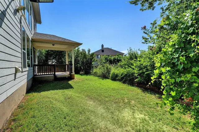 a view of a backyard with a garden