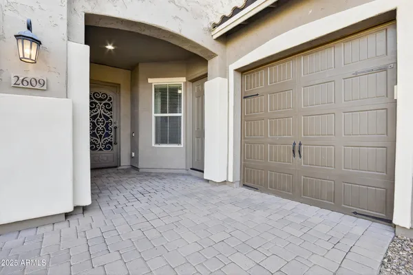 an empty room with entrance and door