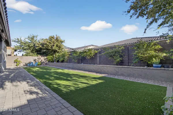 a view of a back yard of the house
