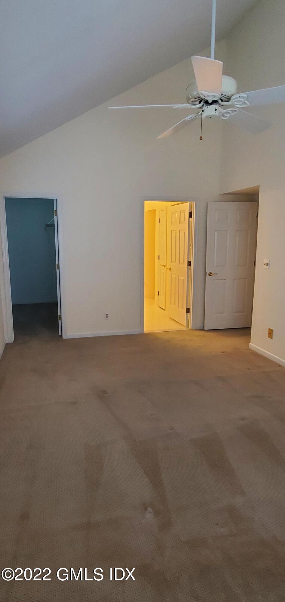 351 Pemberwick Road, Unit 821 Greenwich, CT 06831 - Photo 8 of 16 a view of an empty room with a window