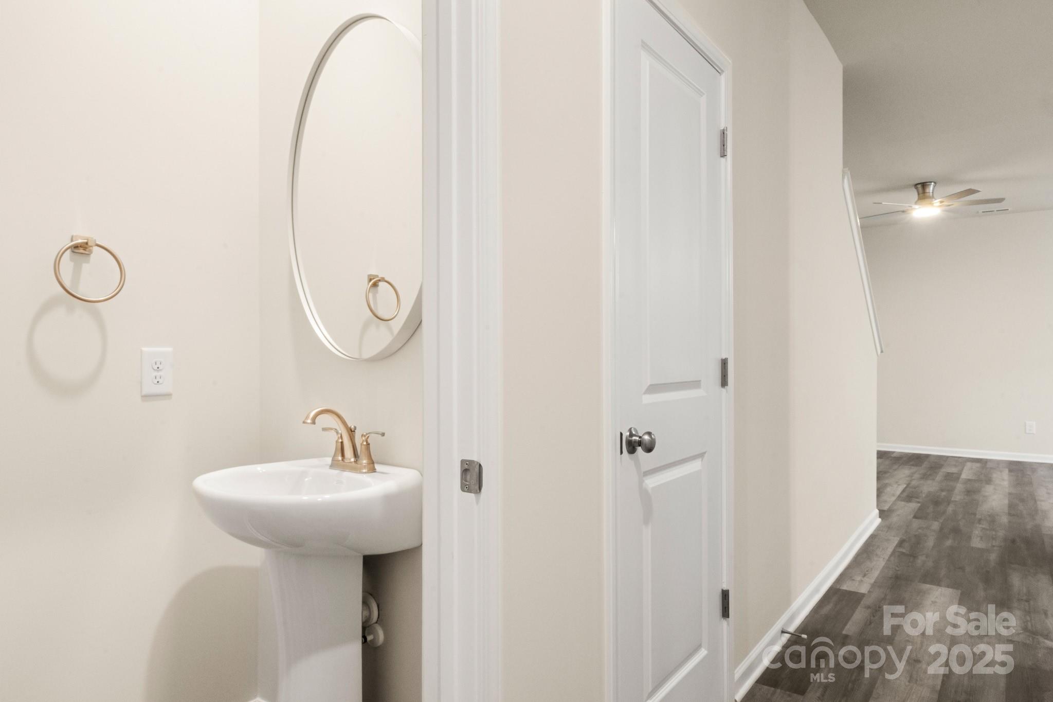 990 Shearers Road Mooresville, NC 28115 - Photo 12 of 46 a bathroom with a sink and mirror