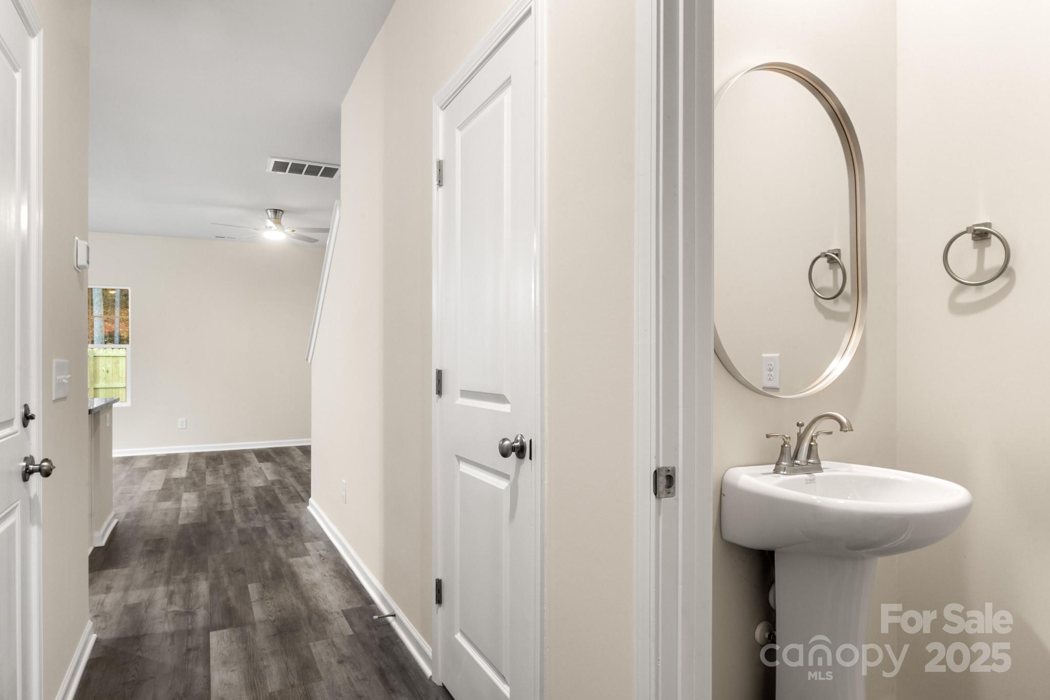 990 Shearers Road Mooresville, NC 28115 - Photo 24 of 46 a bathroom with a sink and a mirror