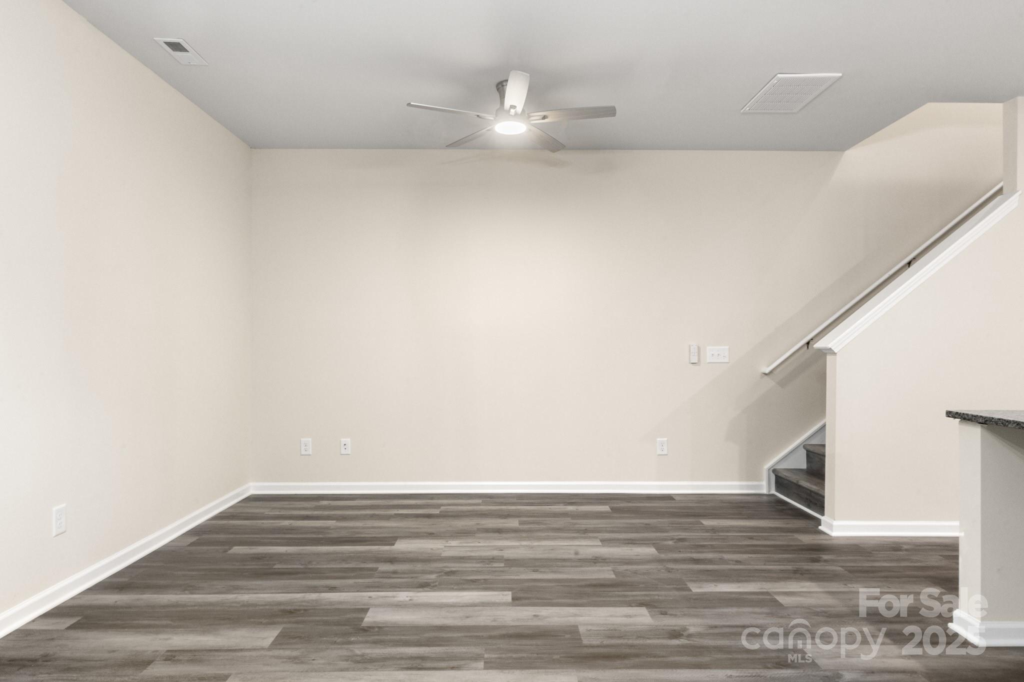 990 Shearers Road Mooresville, NC 28115 - Photo 29 of 46 a view of an empty room with wooden floor