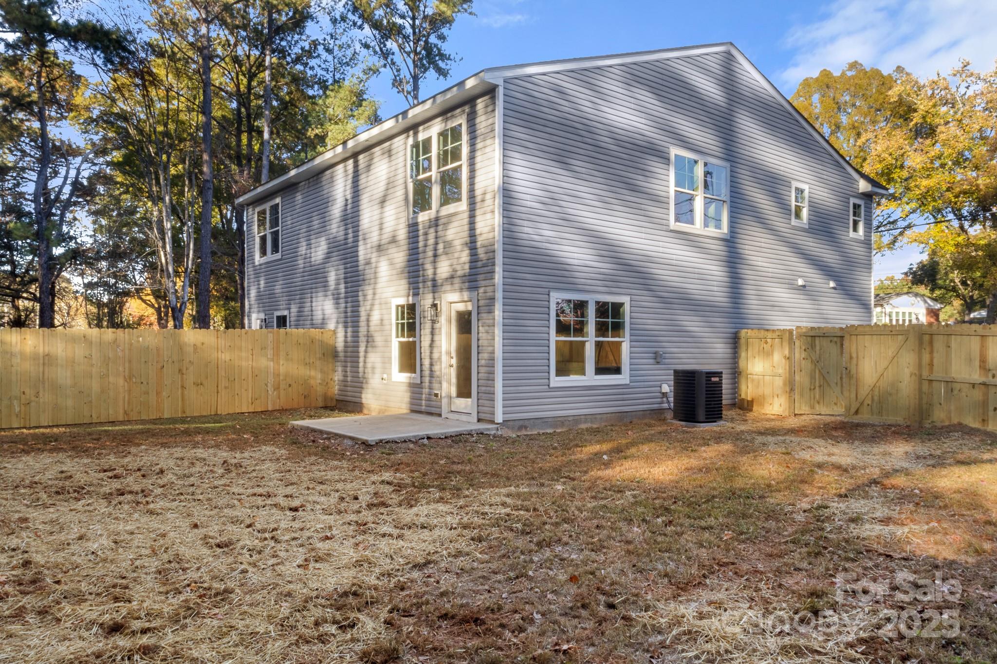990 Shearers Road Mooresville, NC 28115 - Photo 45 of 46 a view of a house with a yard