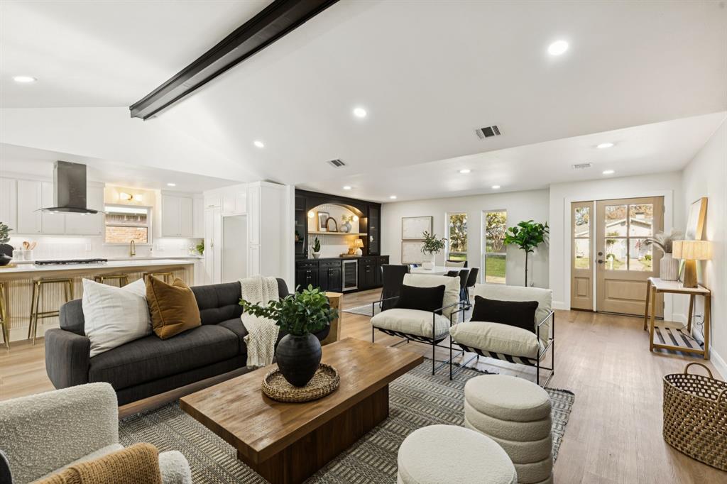 311 High Brook Drive Richardson, TX 75080 - Photo 2 of 26 Living room featuring light wood-style flooring, wine cooler, and recessed lighting