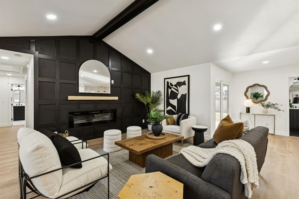 311 High Brook Drive Richardson, TX 75080 - Photo 4 of 26 Living room with light wood finished floors, recessed lighting, a fireplace, and attic access