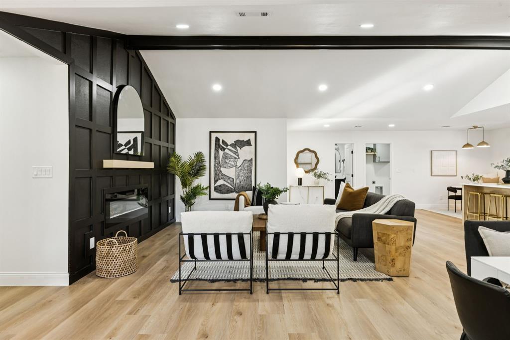 311 High Brook Drive Richardson, TX 75080 - Photo 5 of 26 Living area with light wood-style flooring and recessed lighting
