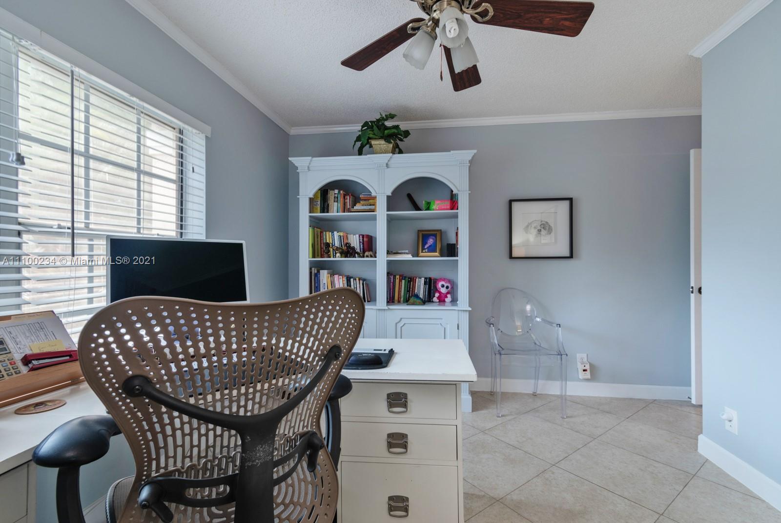 207 Cameron Court Weston, FL 33326 - Photo 21 of 35 a living room with furniture and a wooden floor