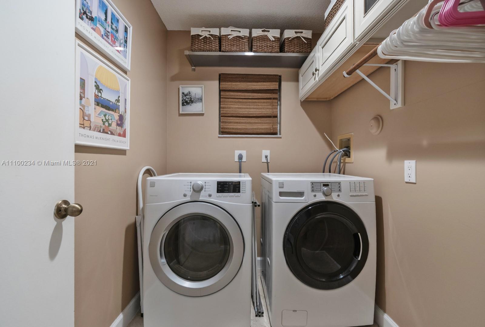 207 Cameron Court Weston, FL 33326 - Photo 29 of 35 a utility room with dryer and washer