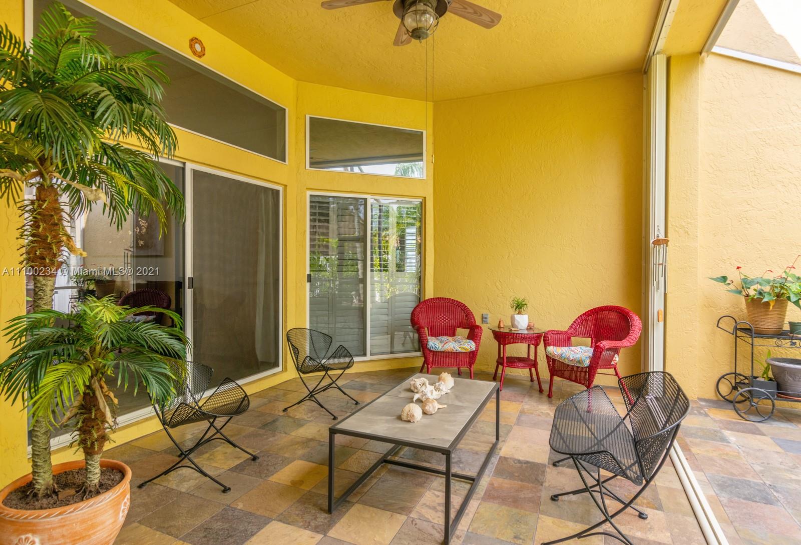 207 Cameron Court Weston, FL 33326 - Photo 31 of 35 a outdoor space with chairs