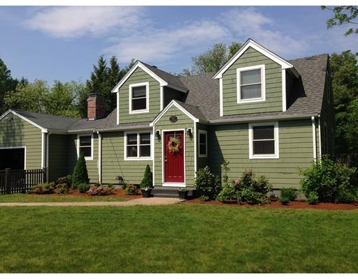 152 Haynes Road Sudbury, MA 01776 - Photo 1 of 25 a front view of house with yard and green space