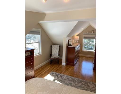 152 Haynes Road Sudbury, MA 01776 - Photo 15 of 25 a living room with furniture and a flat screen tv