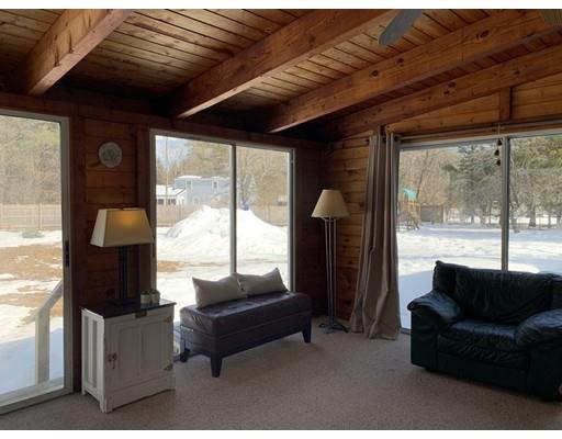 152 Haynes Road Sudbury, MA 01776 - Photo 19 of 25 a living room with furniture and a large window