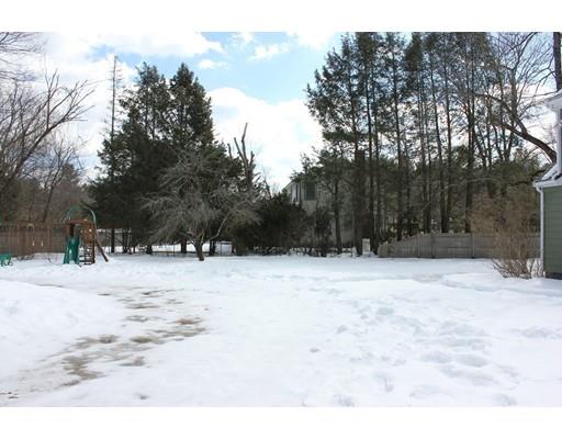 152 Haynes Road Sudbury, MA 01776 - Photo 21 of 25 a view of a yard covered in snow