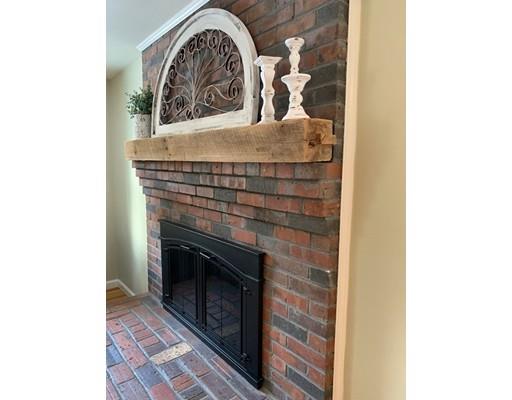 152 Haynes Road Sudbury, MA 01776 - Photo 5 of 25 a close view of a fireplace in a room