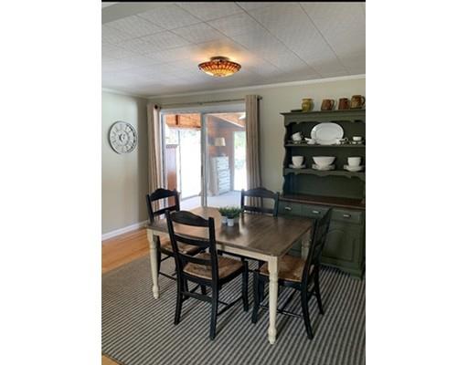 152 Haynes Road Sudbury, MA 01776 - Photo 9 of 25 a view of a dining room with furniture and window