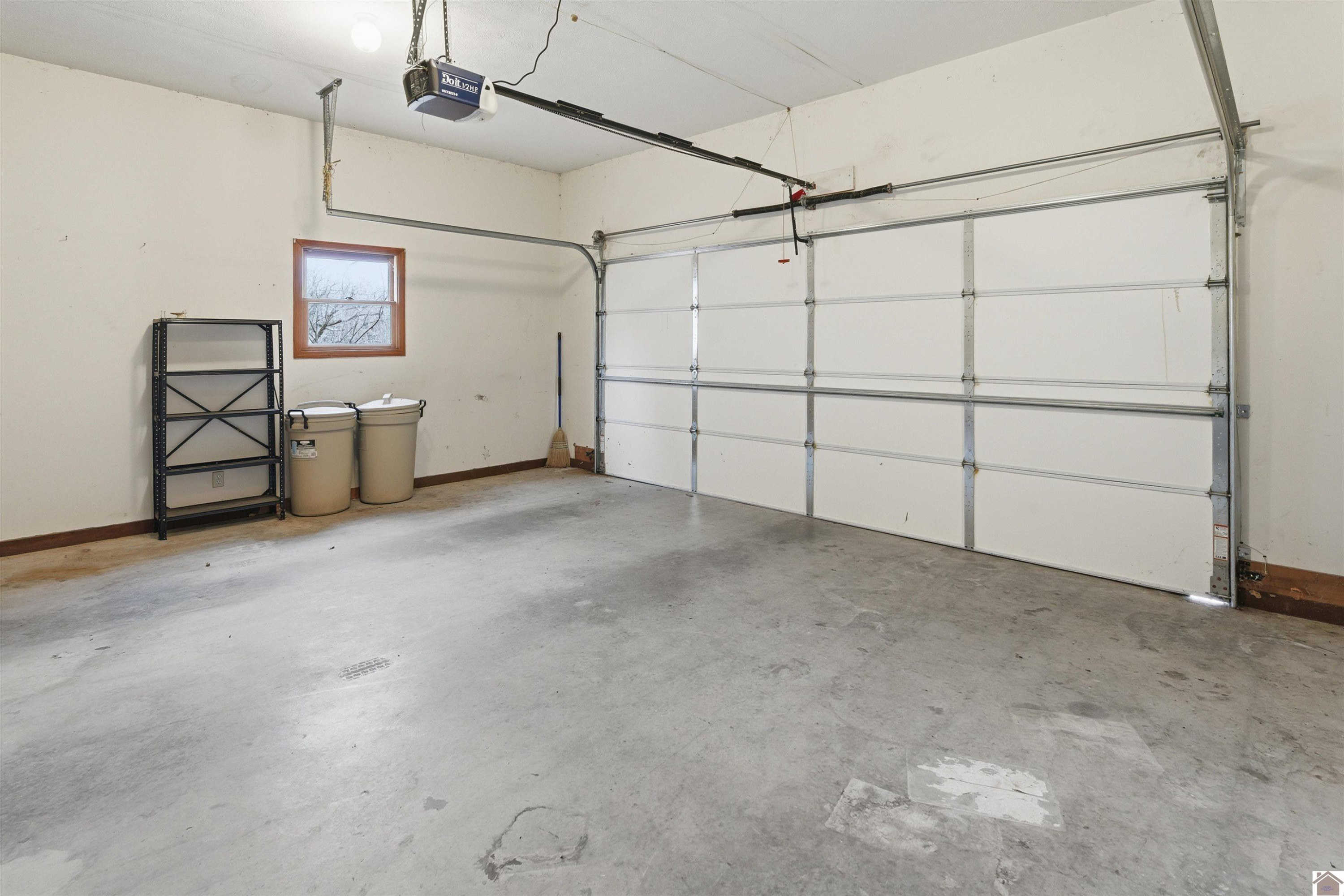 915 Jake Dukes Road Grand Rivers, KY 42045 - Photo 35 of 49 Interior of Attached Garage