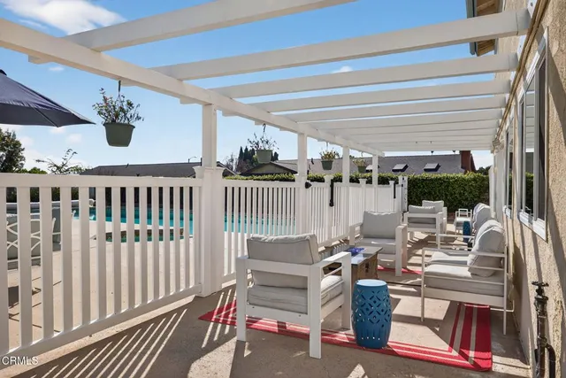 a view of a porch with furniture