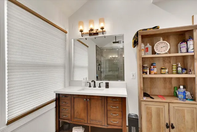 a bathroom with a shower and toilet