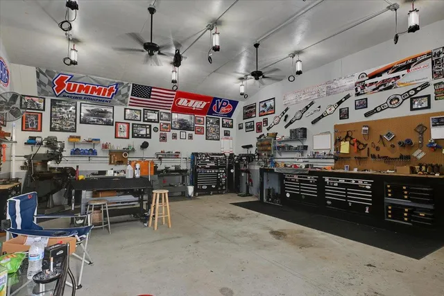a aerial view of a house with a yard