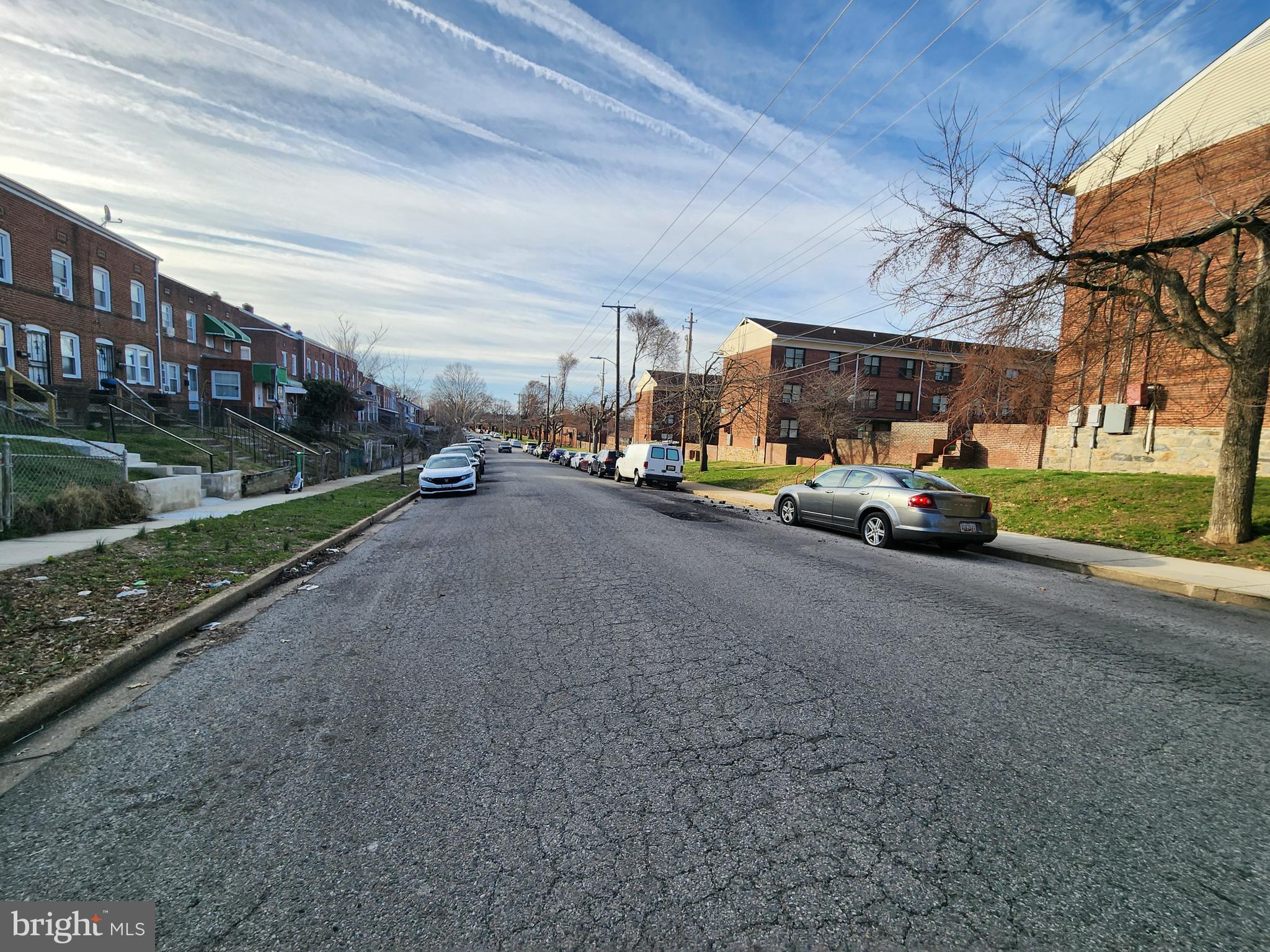 2723 Round Road Baltimore, MD 21225 - Photo 17 of 18 a view of a street in front of a house