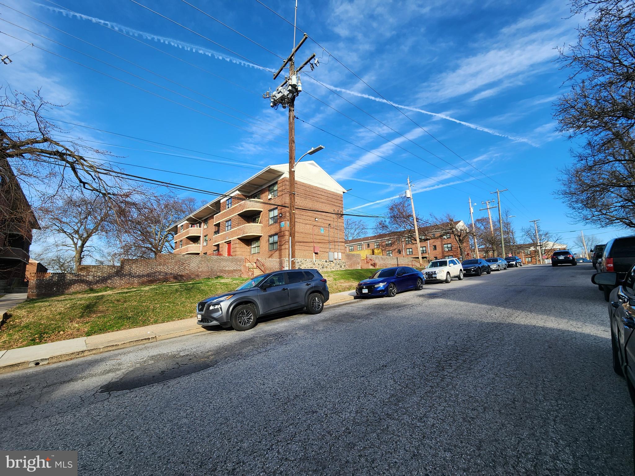 2723 Round Road Baltimore, MD 21225 - Photo 18 of 18 a view of a street with cars