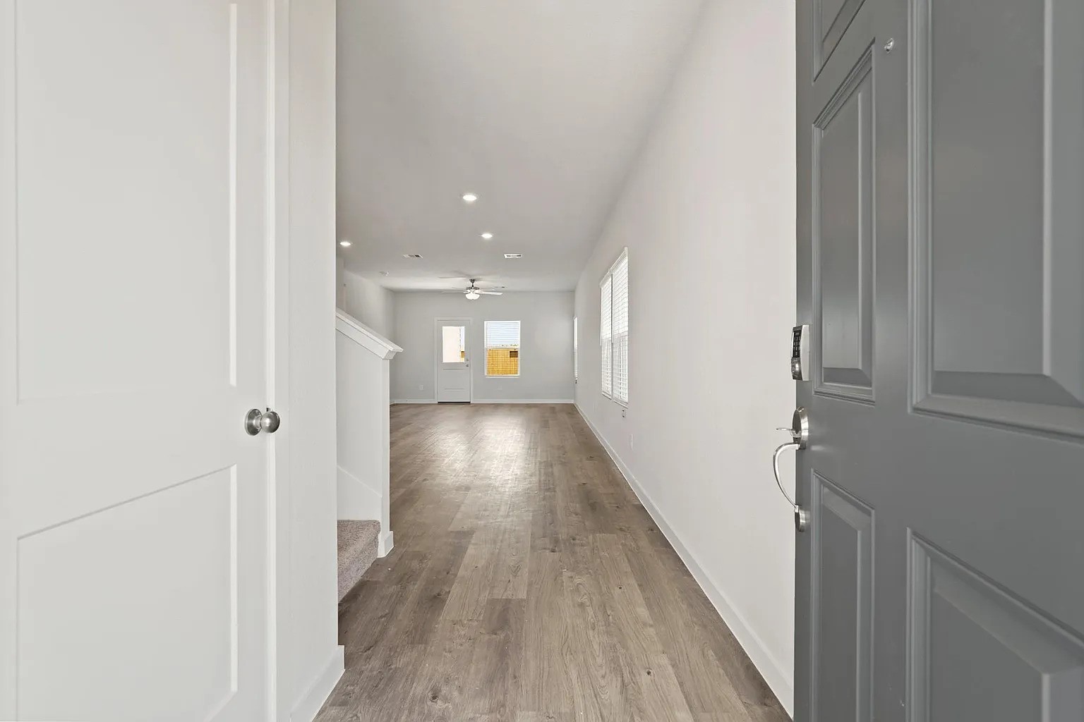 3927 Accolade Crossing Brookshire, TX 77423 - Photo 2 of 21 a view of gallery with wooden floor