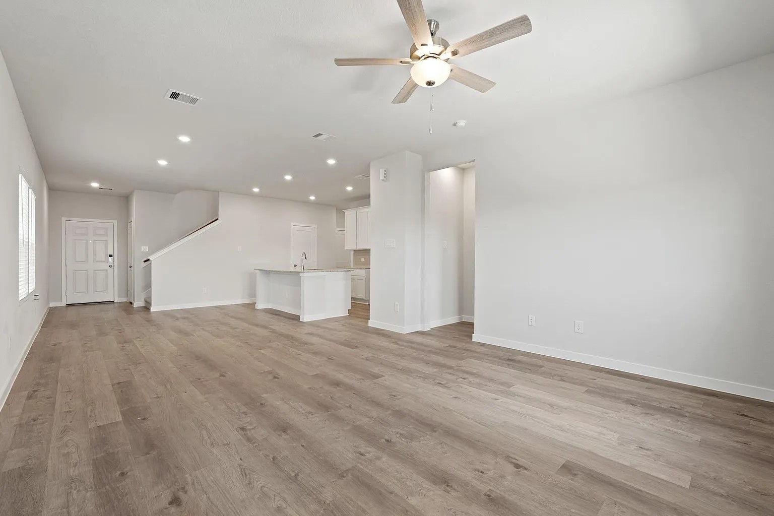 3927 Accolade Crossing Brookshire, TX 77423 - Photo 4 of 21 a view of an empty room with a ceiling fan